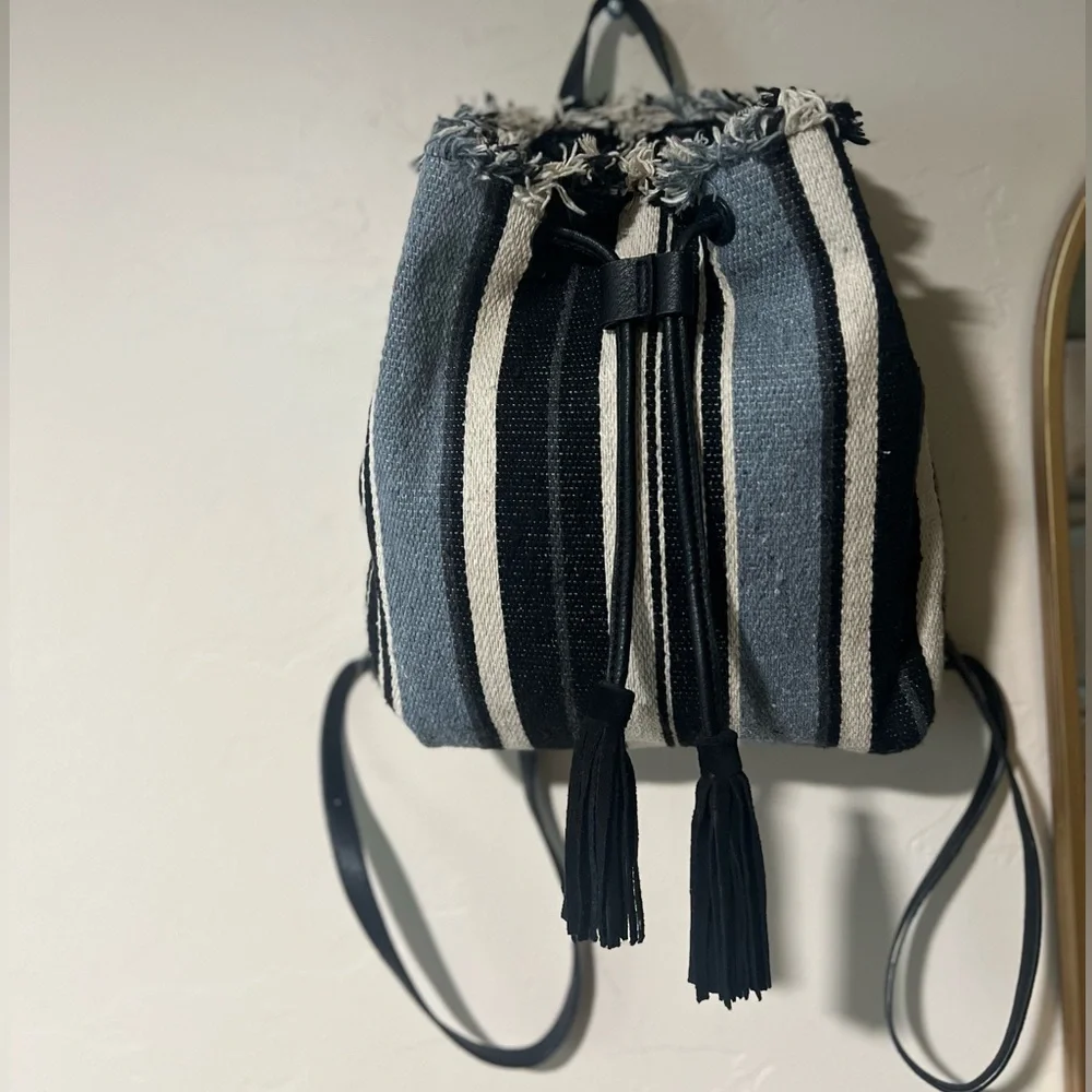 Lucky Brand Alzon Drawstring Clinched Fringed Backpack Blue, Black and Cream
